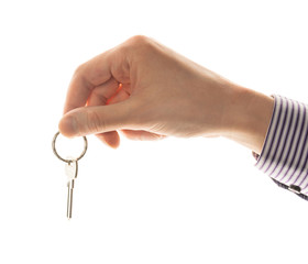 Keys in hand isolated on white