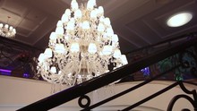 Luxury Large Crystal Chandelier Hanging In The Palace. Vintage Lighting Lamps