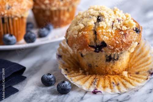 Fotomural Blueberry Muffin With Berries on a Marble Surface