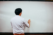 Businessman Drawing And Writing Something On White Board - With Copy Space