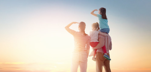 Poster - happy family at sunset.