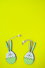 Wall Mural - Easter Bunny on a yellow background. View from above. Copy space, space for text.