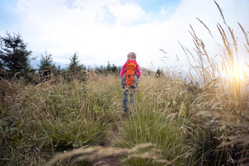 Wall Mural - girl child in the mountains