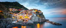 Manarola Village, Cinque Terre Coast Of Italy. Manarola A Beautiful Small Town In The Province Of La Spezia, Liguria, North Of Italy And One Of The Five Cinque Terre Travel Attractions, Sunset Colors