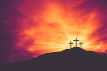 Three Christian Easter And Good Friday Holiday Crosses On Hill Of Calvary With Colorful Clouds In Sky - Crucifixion Of Jesus Christ Background
