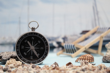 Time to Travel. Idea for tourism with passport, tickets and compass on the background of the sea and yacht. Concept on the theme of flights.