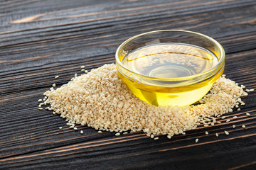 Wall Mural - sesame oil in glass bowl