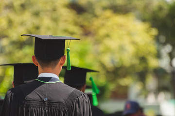 Shot of graduation hats during commencement success graduates of the university, Education congratulation in University. 