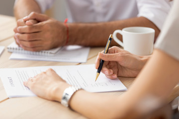 Sticker - Female client ready to sign contract at meeting with lawyer