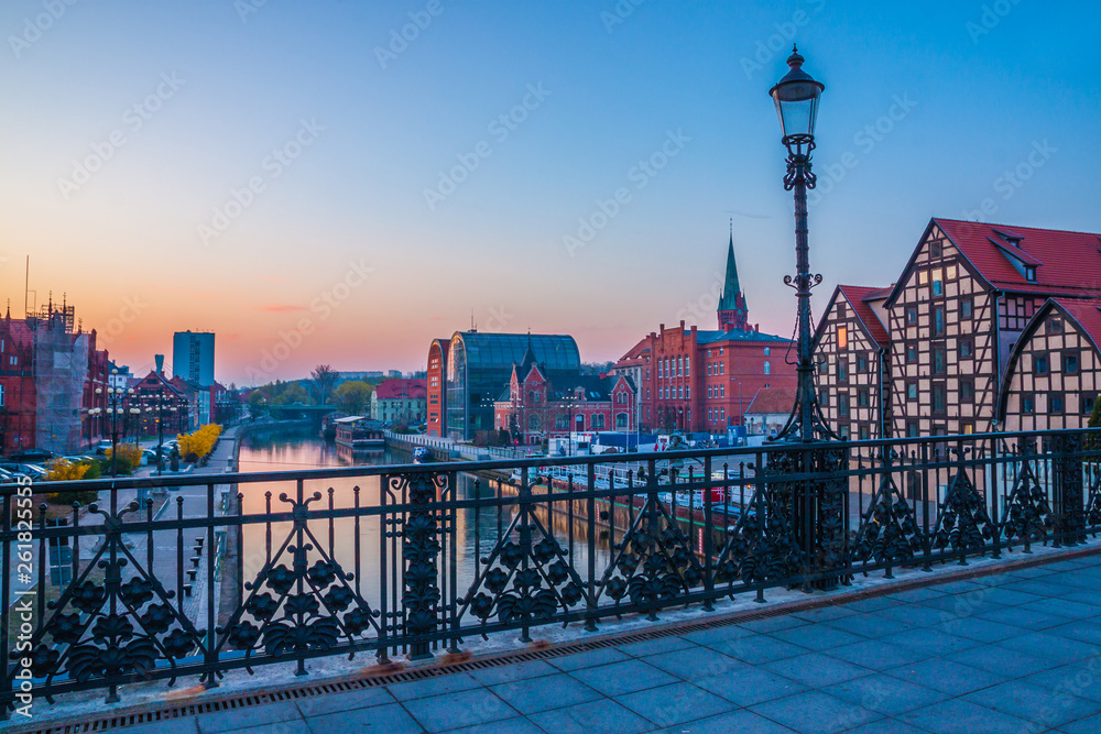 Bydgoszcz old town at amazing sunrise with reflection in Brda river. Bydgoszcz. Poland - obrazy, fototapety, plakaty 