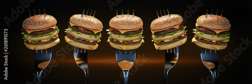 Cuadros en Lienzo A small hamburger stuck in the fork