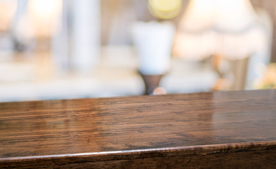 Leinwandbilder - wood table at restaurant blur background.Empty perspective hardwood bar with blur coffee shop with bokeh light,Mock up for display or montage of product,Banner or header for advertise on online media