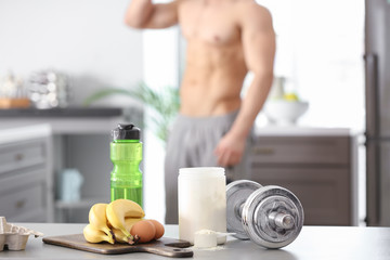 Sticker - Ingredients for protein shake and dumbbell on table