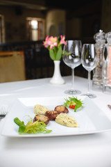 Wall Mural - grilled scallops with celery puree and vegetables. on a white plate