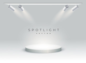 five modern spotlights shine on the podium, spot, stage. empty. spotlight shines at an angle on spot