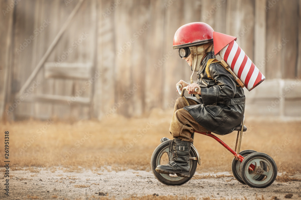 Boy play in the rider and the rocketman - obrazy, fototapety, plakaty 