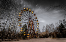 Old Ferris Wheel In The Ghost Town Of Pripyat. Consequences Of The Accident At The Chernobil Nuclear Power Plant