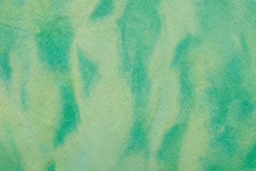 green watercolor pastel painted on paper background texture