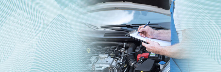 Car mechanic checking a car engine. panoramic banner