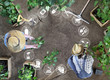 © amedeoemaja - gardening equipment icons, man and woman together work in the vegetable garden, place a plant in the ground, top view from above with copy space