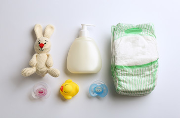 Wall Mural - flat lay composition with baby accessories on white background