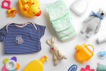 Wall Mural - flat lay composition with baby accessories on white background
