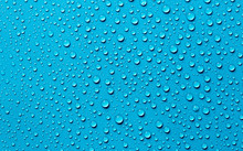 Water Drops On Blue Background