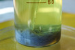 The blue precipitate of chromium carbonate settled at the bottom of the beaker. The substance is insoluble in water.