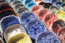 Traditional Handpainted Oriental Pottery On A Market Stall