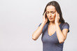 © denis_vermenko - Young beautiful woman over isolated background suffering from headache desperate and stressed because pain and migraine. Hands on head.