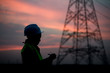 © reewungjunerr - Silhouette of asian engineer working on sunset,Thailand people work on sunset