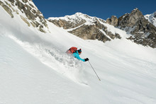 Switzerland, Grand Saint Bernard Pass, Pain De Sucre, Mont Fourchon, Woman On A Ski Tour In The Mountains Riding Downhill