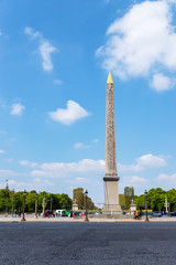 Wall Mural - Luxor Obelisk on Place de la Concorde with Arc de Triomphe in background