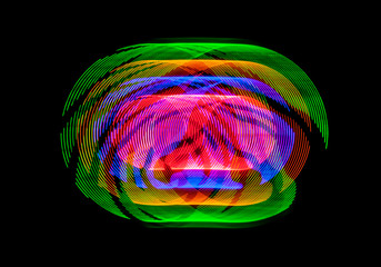 Trayectorias circulares formadas por LEDS de colores que se encienden y apagan al ritmo de diferentes patrones digitales.