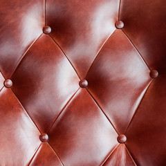 Pattern from vintage leather sofa for background, brown leather sofa.