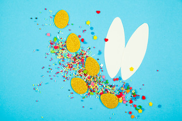 Poster - Color eggs and bunny ears on color background