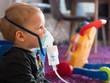 © MaZvone - Blonde caucasian small boy with oxygen mask at home
