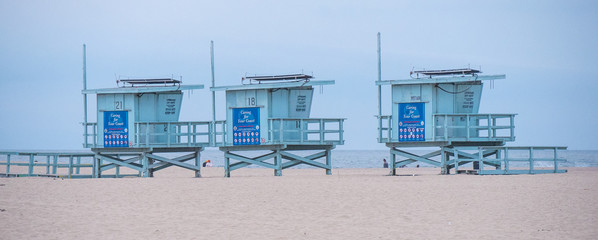 Wall Mural - Lifeguard towers at Venice Beach California - travel photography