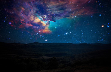 Wall Mural - nature landscape and constellation over it, elements of this image furnished by nasa b