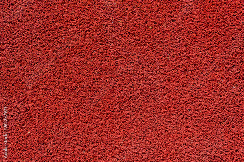 Detail of red rubber mat floor background texture - Buy this stock