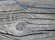 The wood structure with the knot and cracks. Natural background