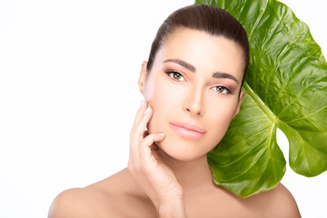 Wall Mural - Skincare concept. Beauty spa woman and green leaf