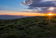 Sunset Landscape Over Small Village With Mountains, Clouds And Orange Sky, Lesotho, Africa