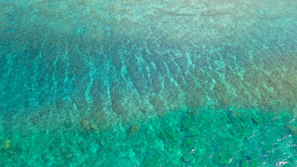 Wall Mural - Beautiful nature of blue sea sand and Turquoise color water waves at Atauro Island, Timor Leste