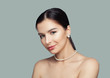 © millaf (Nemchinova) - Beautiful woman with healthy skin wearing white pearls jewelry necklace