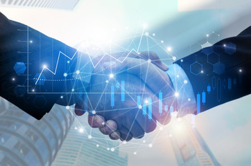 Wall Mural - Partnership - business man handshake with effect global network connectionà¸¡ graph chart stock market graphic diagram and city background, digital technology, internet communication, teamwork concept