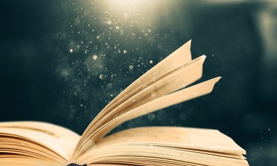 Wall Mural - open book on old wooden table