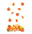 Set of delicious candies falling into pile on white background