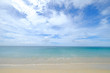 © Mongkol - Calm and clear sea view of turquoise water on cloudy blue sky day