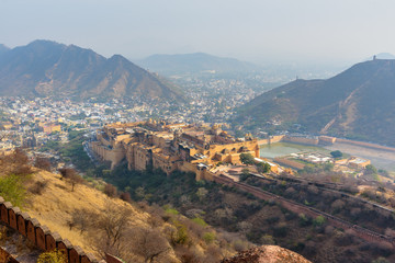 Wall Mural - View of Amber fort and palace in Maotha Lake from Jaigarh Fort. Rajasthan. India